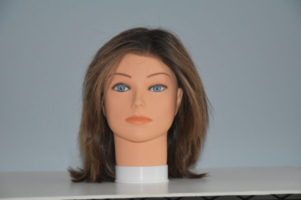 med length brown wig on mannequin head
