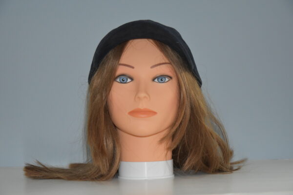 hair attached to soft piece of fabric