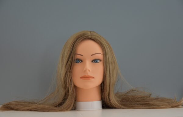 long blonde synthetic wig on mannequin head