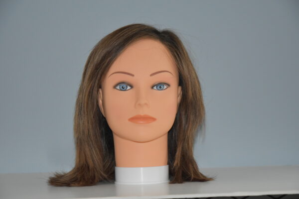 med length brown wig on mannequin head