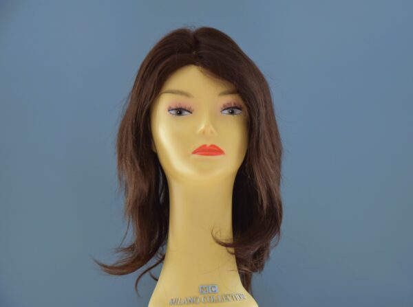 long brown human hair wig on mannequin head