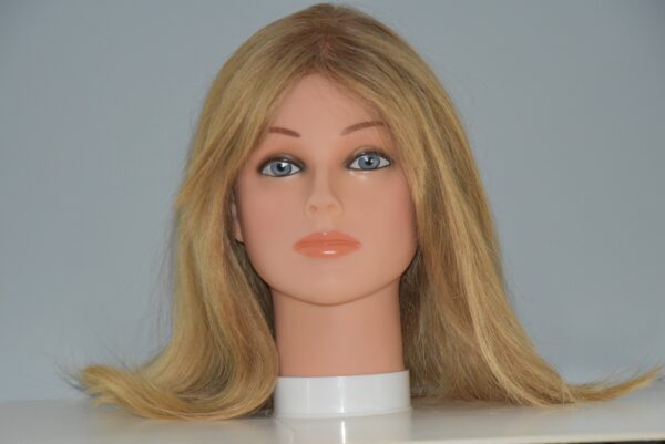 long blonde human hair wig on mannequin head