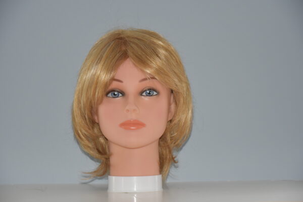 short blonde synthetic wig on mannequin head