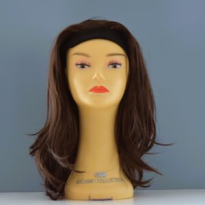 long brown synthetic wig on mannequin head