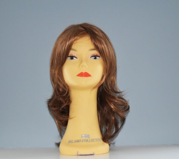 Long brown synthetic wig on mannequin head