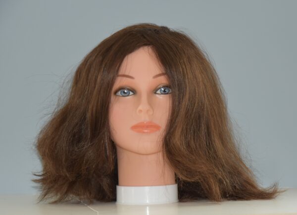 brown medium length synthetic wig on mannequin head