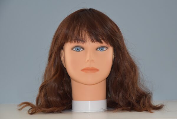 medium length synthetic brown wig on mannequin head