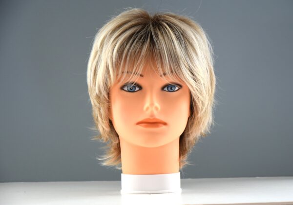short blonde synthetic wig on mannequin head
