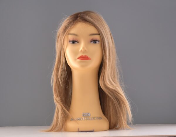 Long blonde synthetic wig on mannequin head