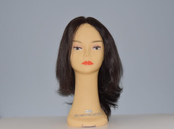 long brown synthetic wig on mannequin head