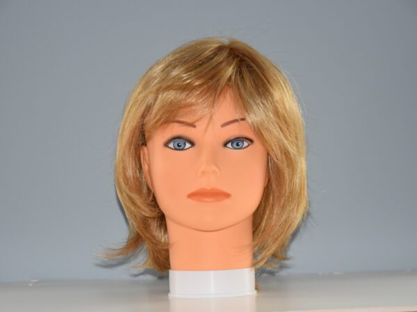 short blonde synthetic wig on mannequin head
