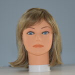 short blonde synthetic wig on mannequin head