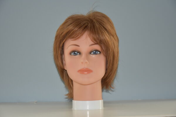 short red synthetic wig on mannequin head