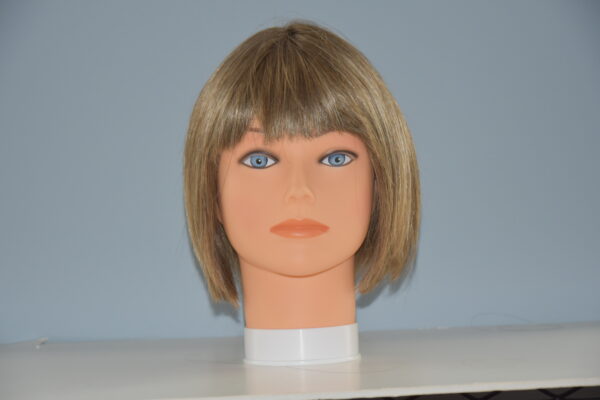 short blonde synthetic wig on mannequin head