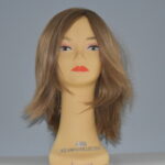 long brown human hair wig on mannequin head