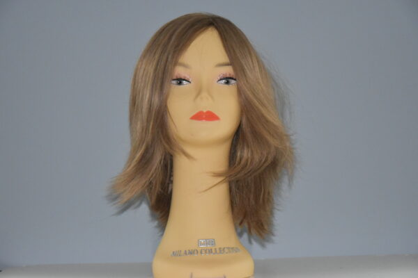 long brown human hair wig on mannequin head