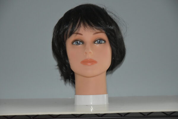 short black synthetic wig on mannequin head