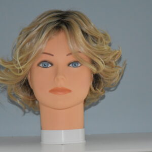 short blonde synthetic wig on mannequin head