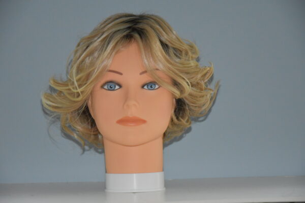 short blonde synthetic wig on mannequin head