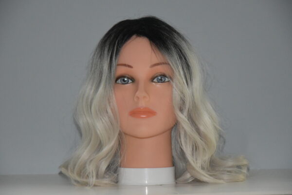 medium length gray synthetic wig on mannequin head