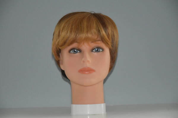 short red synthetic wig on mannequin head