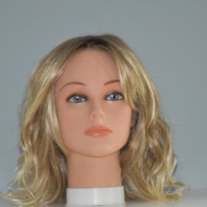 medium length blonde synthetic wig on mannequin head