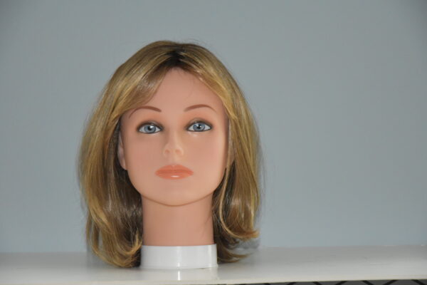 medium length brown wig on mannequin head