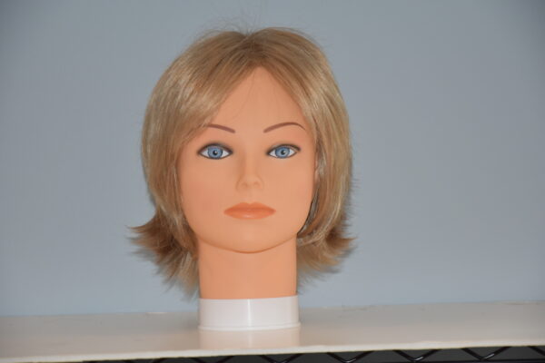 short blonde synthetic wig on mannequin head