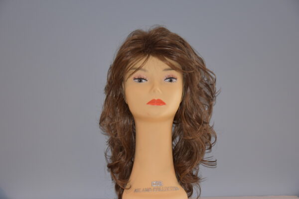 long brown synthetic wig on mannequin head