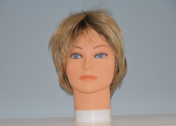 short blonde synthetic wig on mannequin head