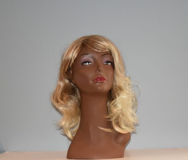 long blonde synthetic wig on mannequin head
