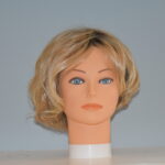 short blonde synthetic wig on mannequin head