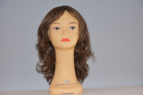 long brown synthetic wig on mannequin head