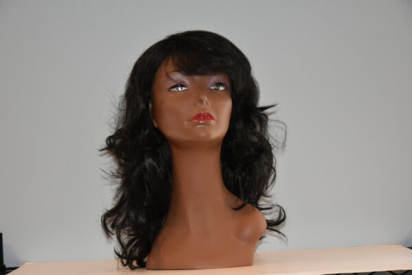 long black synthetic wig on mannequin head