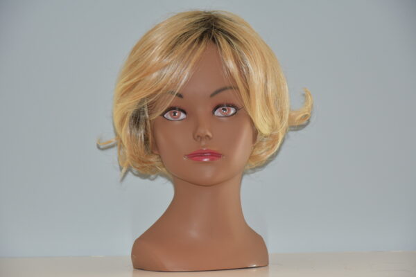 short blonde synthetic wig on mannequin head