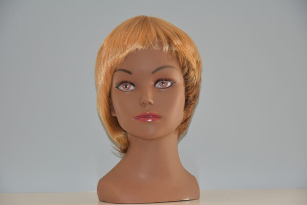 short blonde synthetic wig on mannequin head