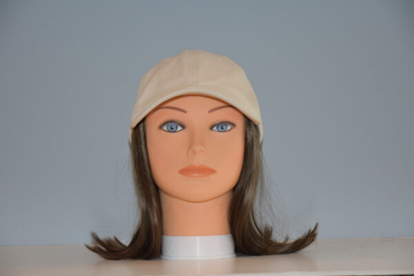medium length brown hair attached to hat