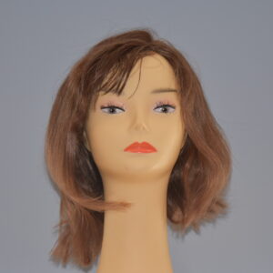 medium length brown human hair wig on mannequin head