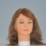 medium length brown human hair wig on mannequin head