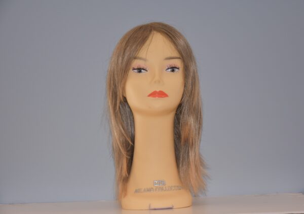 medium length blonde synthetic wig on mannequin head