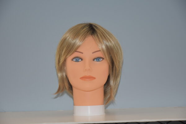 short blonde synthetic wig on mannequin head