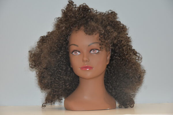 short brown curly synthetic wig on mannequin head