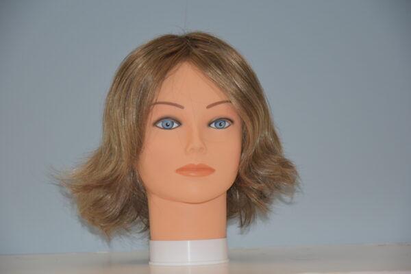 short blonde synthetic wig on mannequin head