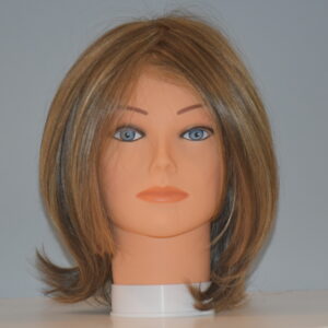 short blond synthetic wig on mannequin head