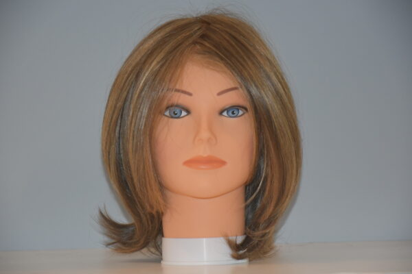 short blond synthetic wig on mannequin head