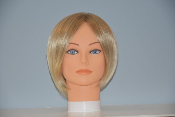 short blonde synthetic wig on mannequin head
