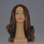 long brown synthetic wig on mannequin head