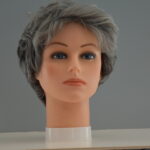 short grey synthetic wig on mannequin head