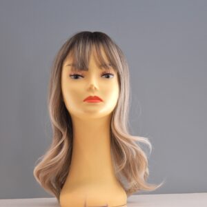 long blonde aynthetic wig on mannequin head