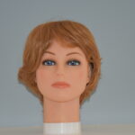 short red synthetic wig on mannequin head